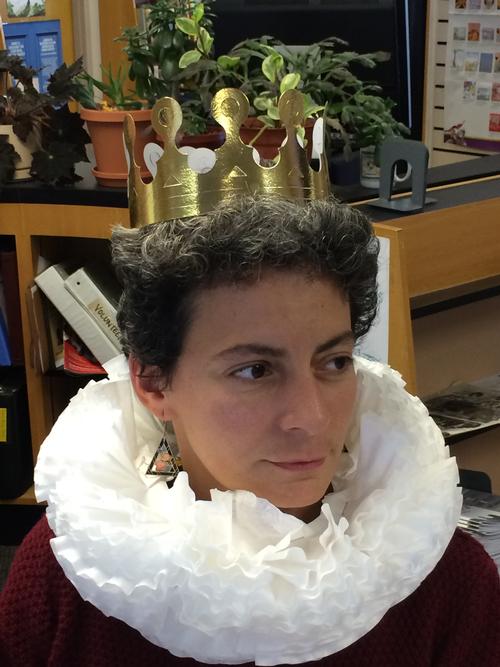 Wadsworth Library's supervisor models one of the ruffled collars.